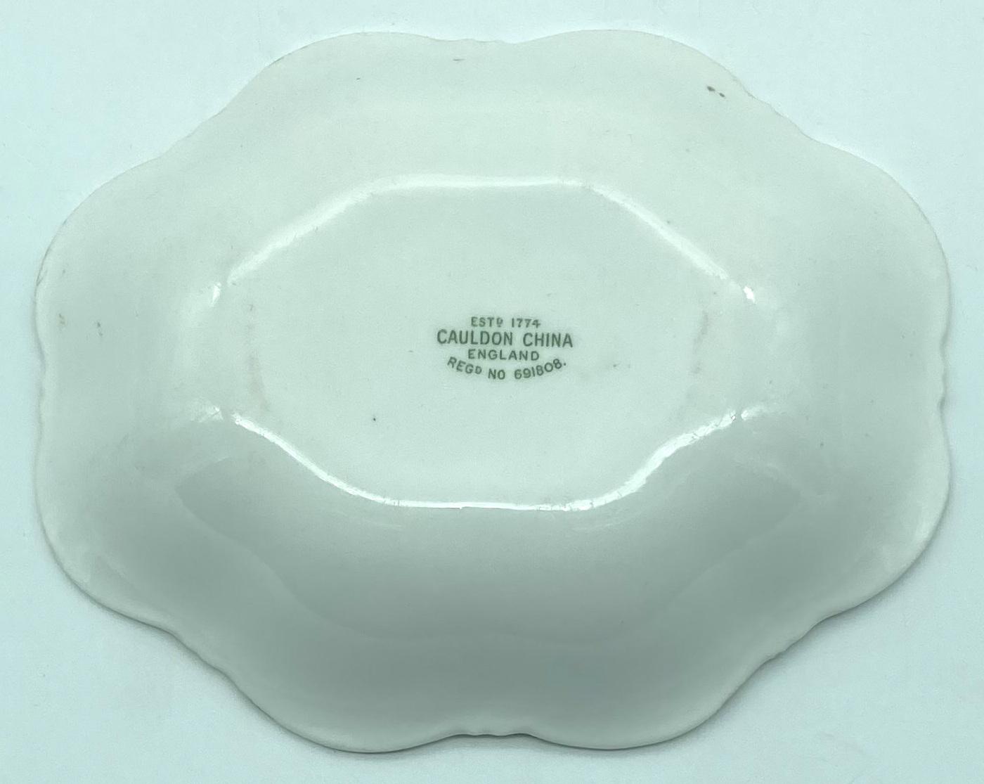 Base of British Empire Exhibition fluted china dish 