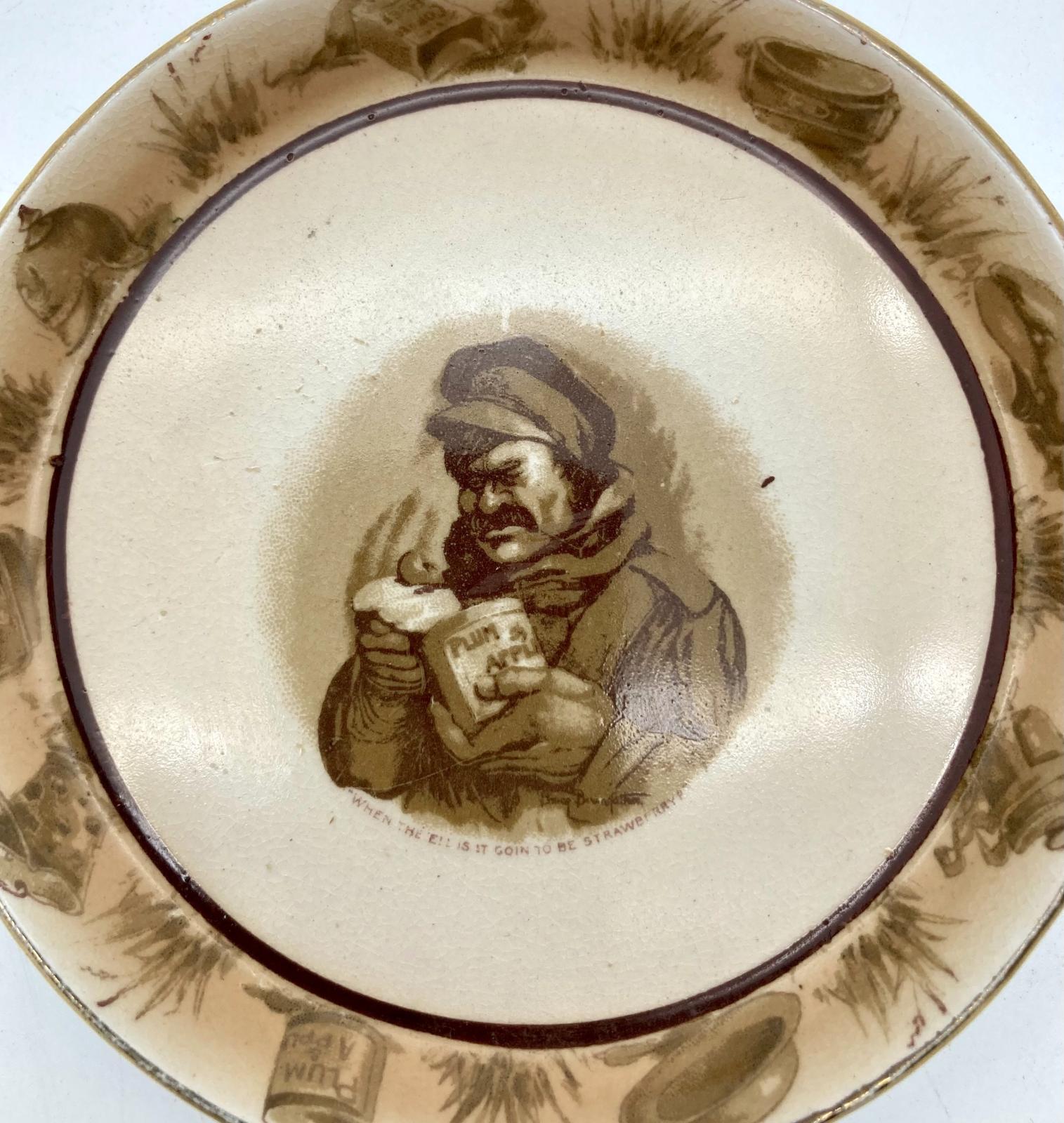 Close-up of WWI era china dish featuring Bruce Bairnsfather cartoon