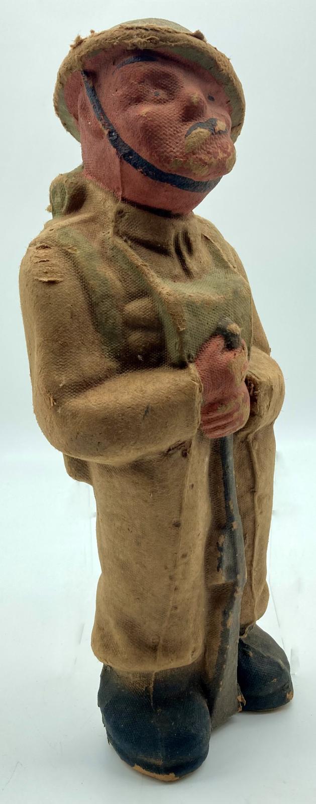 Side view of Bruce Bairnsfather 'Old Bill' fibre figurine 