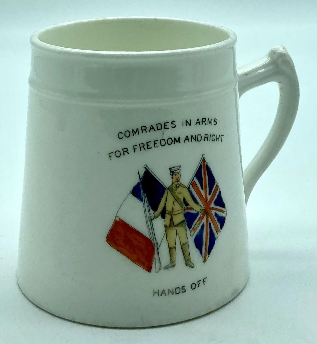 Oblique view of WWI era patriotic bone china tankard