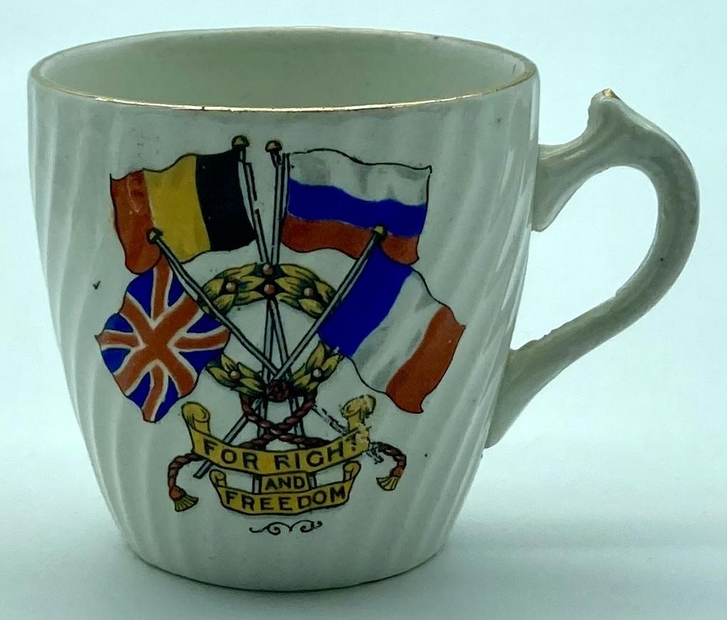 Front view of WWI era patriotic bone china cup 