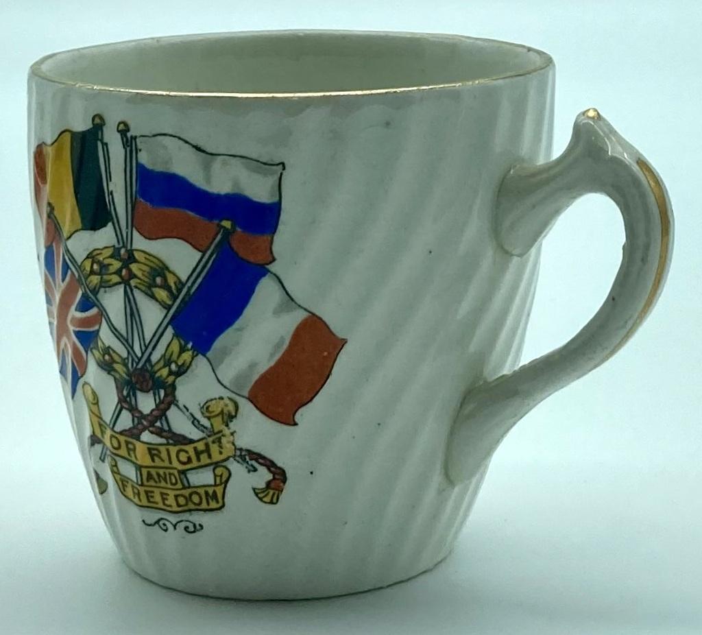 Other side view of WWI era patriotic bone china cup 