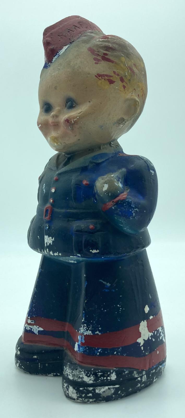 Painted chalkware figurine of R.A.A.F. airman Arthur Hammond - oblique view