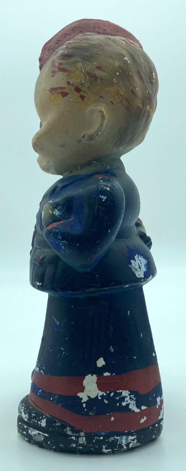 Painted chalkware figurine of R.A.A.F. airman Arthur Hammond - side view