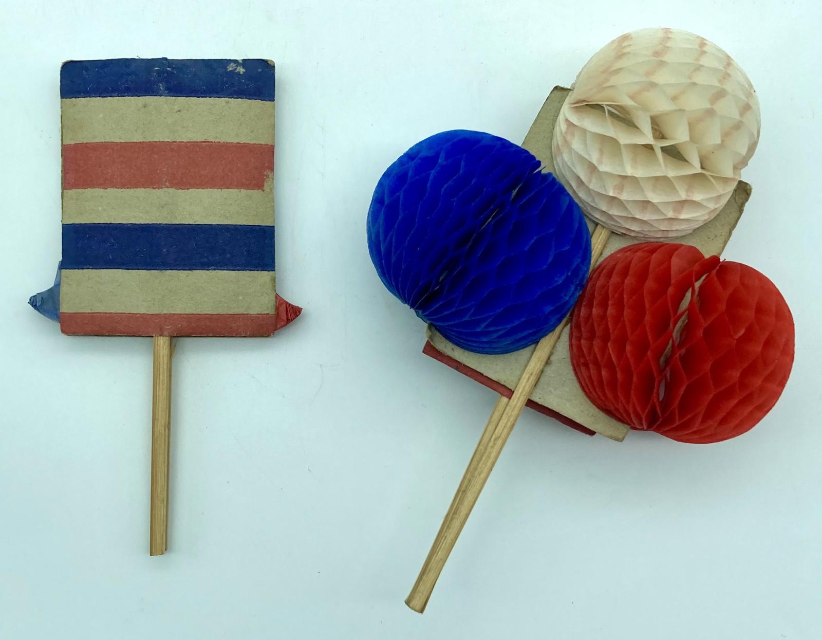 WWI era patriotic fold-out honeycomb balls, showing one closed and one open