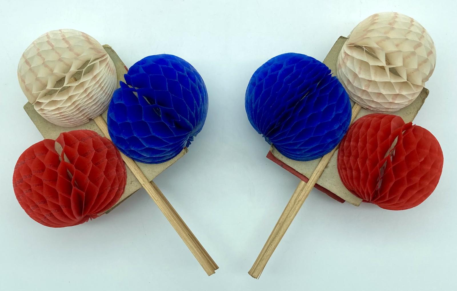 WWI era patriotic fold-out honeycomb balls, showing both open