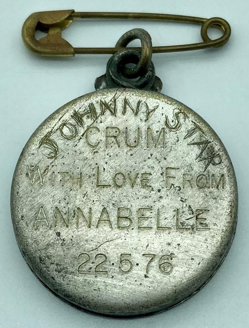 Reverse of WWI era metal locket with French General Joseph Joffre - closed showing modern engraving