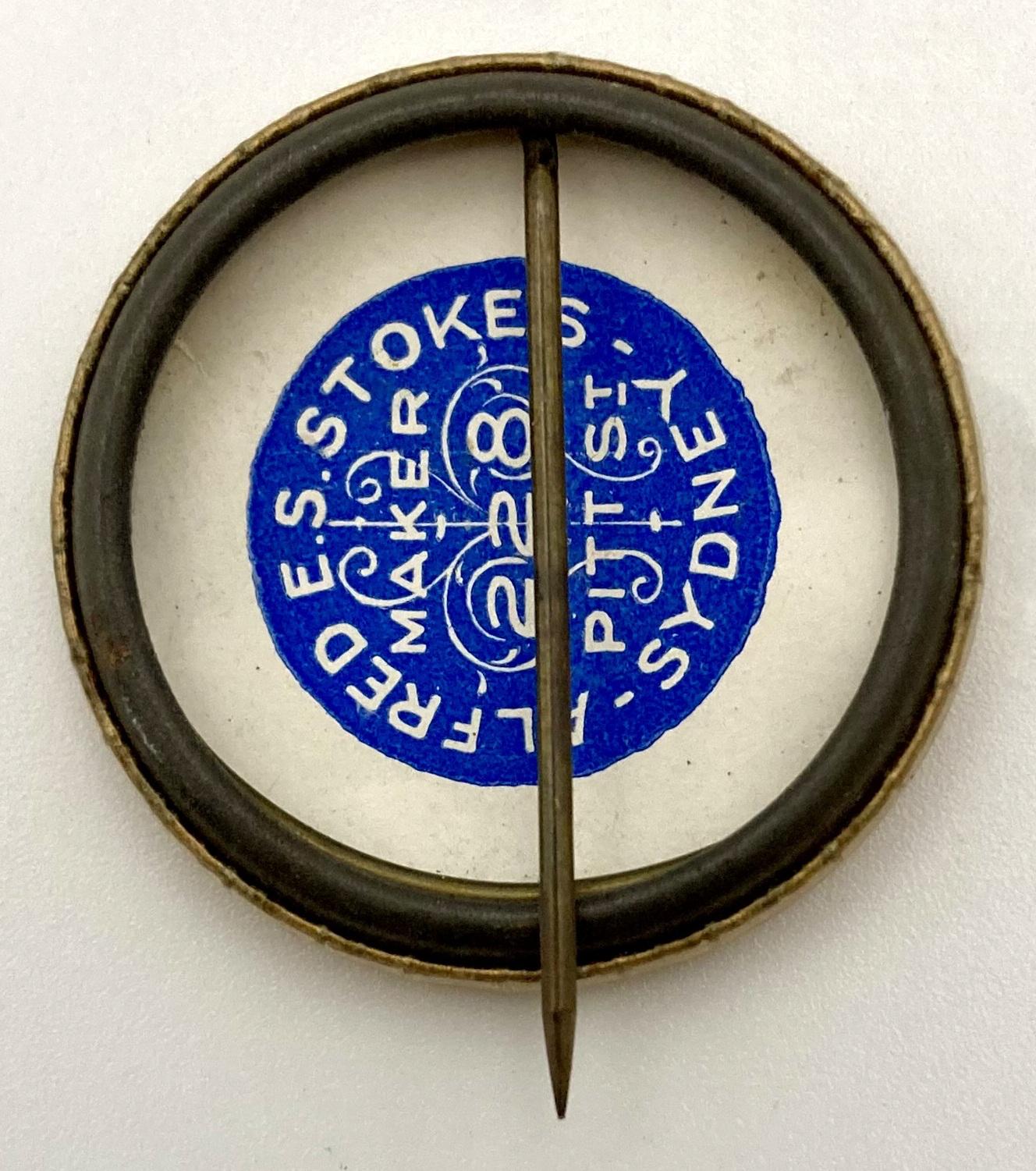 Reverse of Hummock Hill Athletic Club fundraising pin showing maker's details