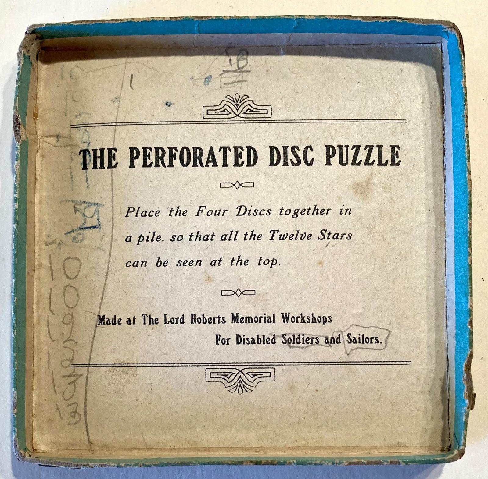 'The Perforated Disc Puzzle' - instructions on underside of box lid