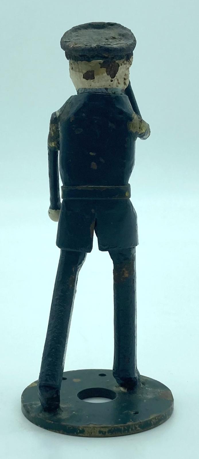 Metal airman figurine made at R.A.F. Biggin Hill - back view