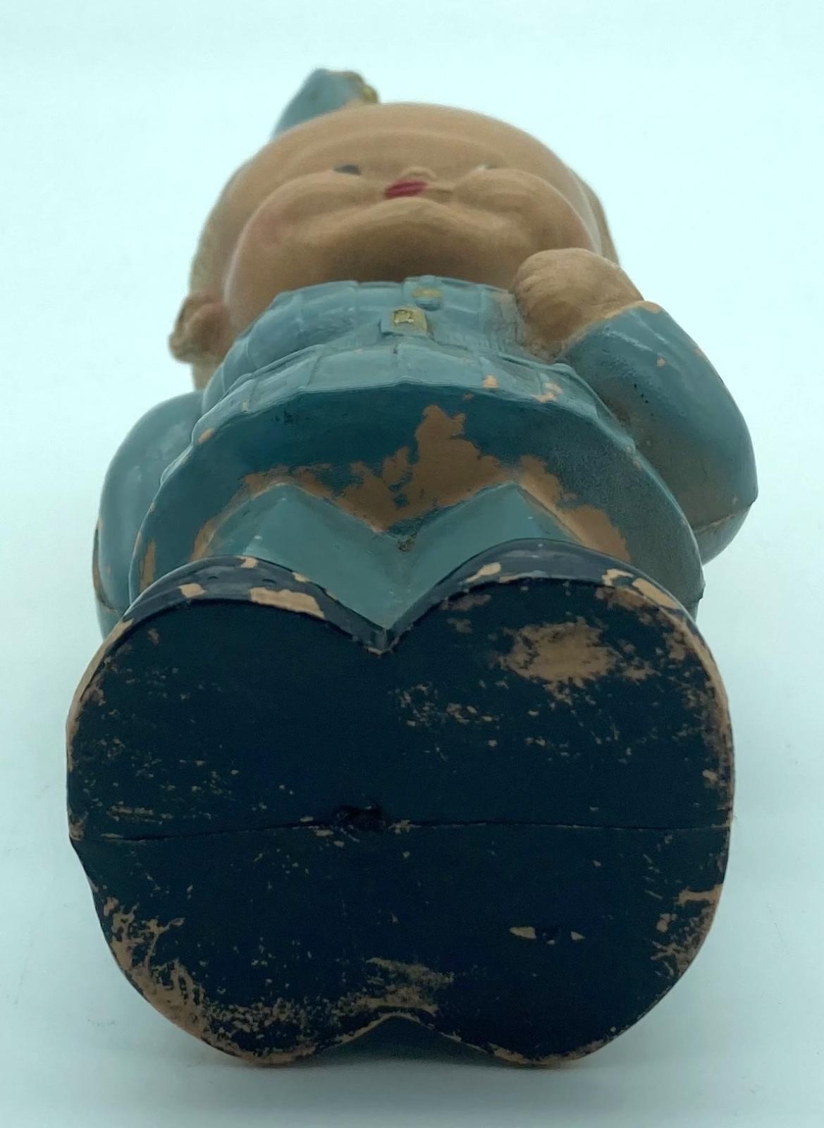 Celluloid figurine depicting an R.A.F. airman - base view