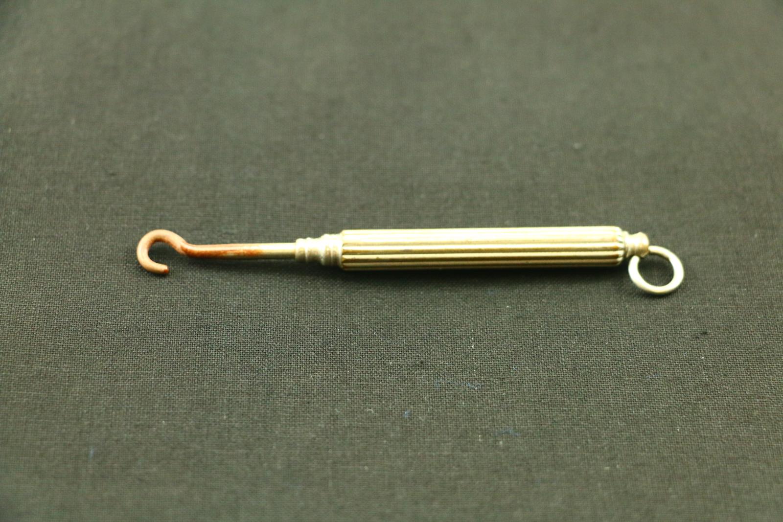 Small silver button hook