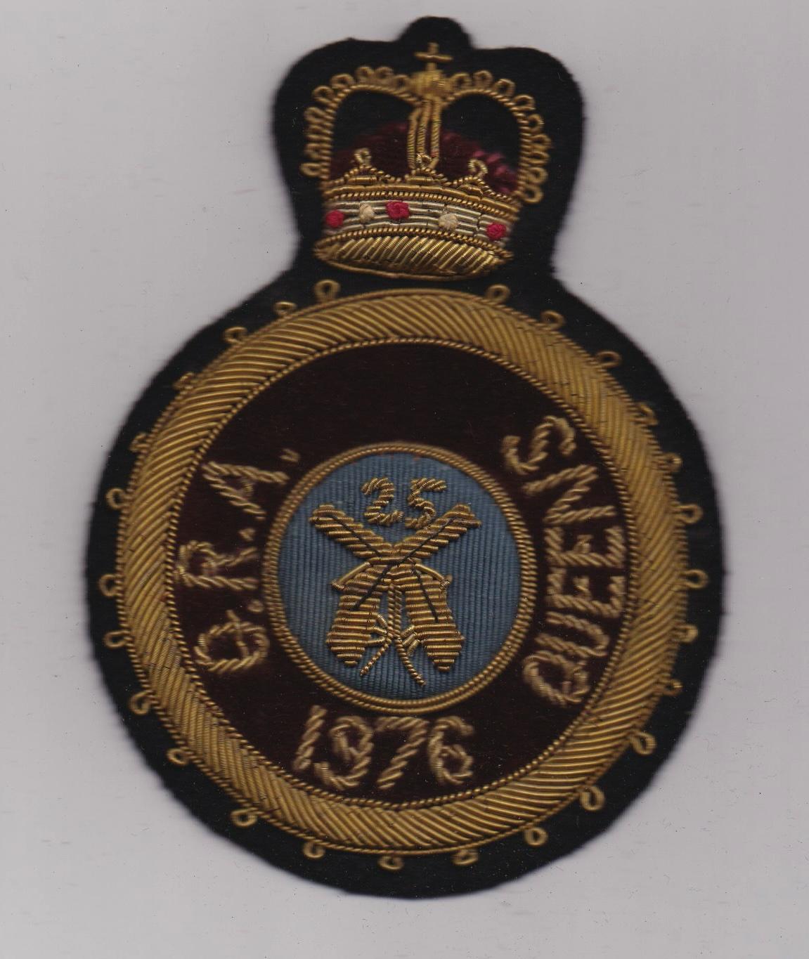 Queen's PM badge