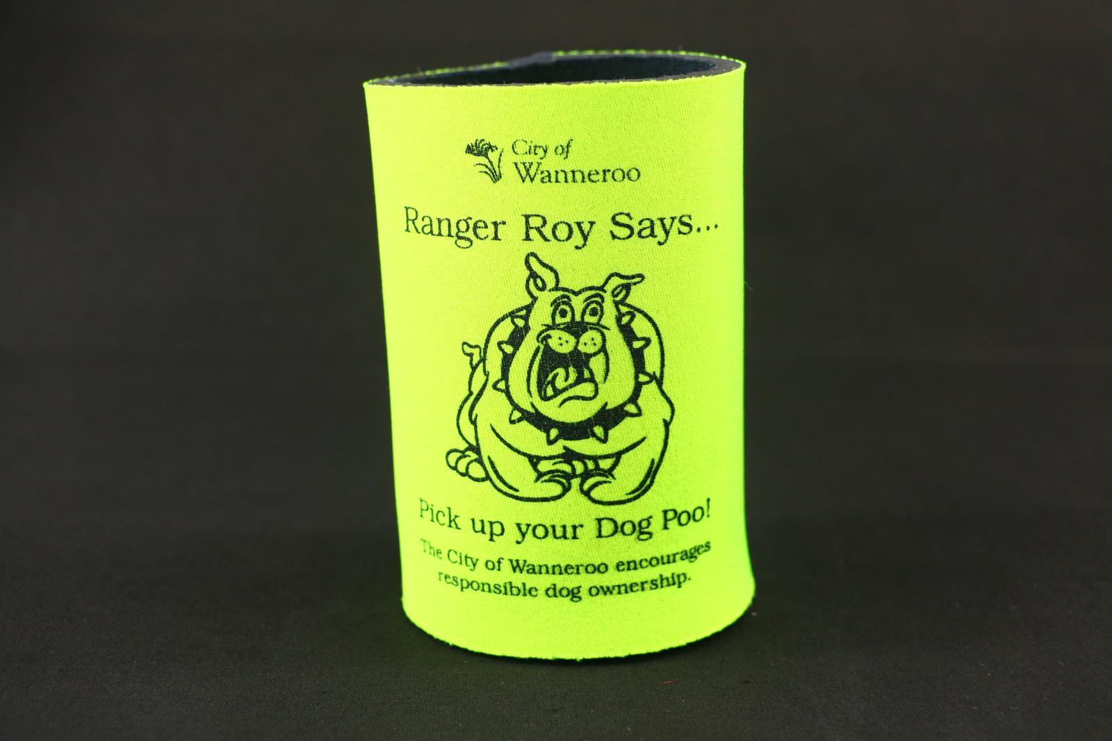 Cylindrical, fluoro yellow / green stubby holder with thick neoprene body and circular rubber base. Rubber base is imprinted with 'diamond plate' pattern. 