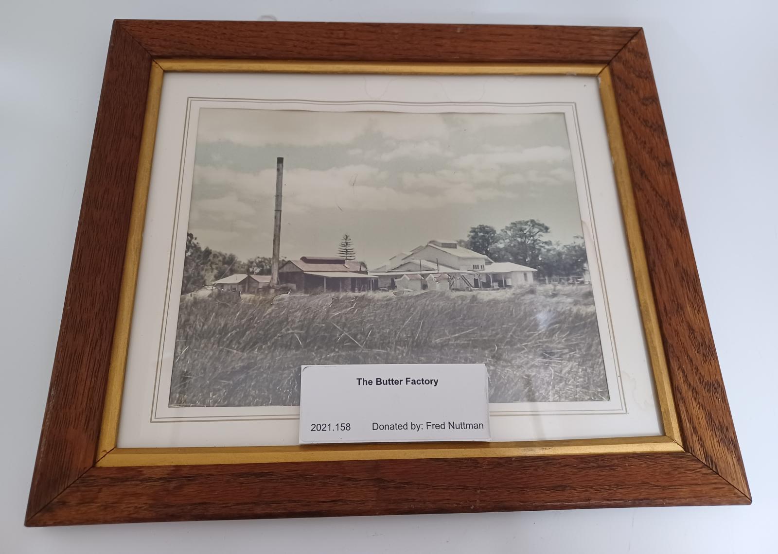 Wooden framed photograph of The Butter Factory