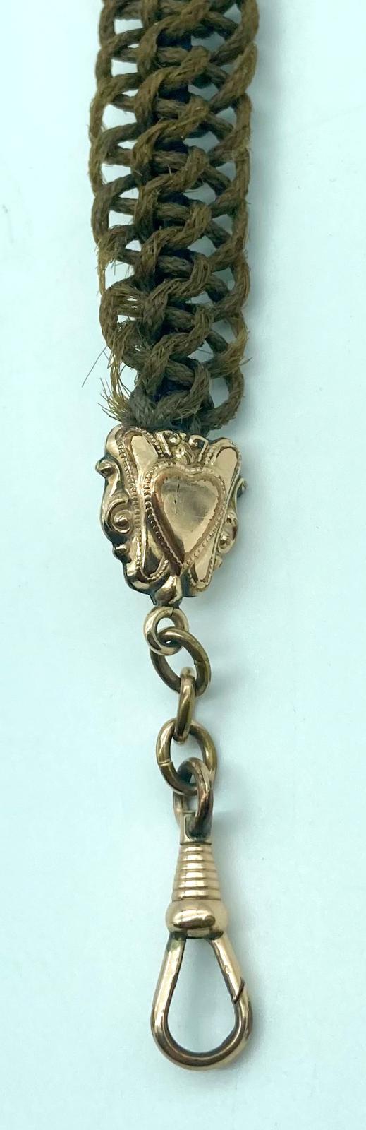 Bottom attachment of mourning Albert chain made from woven human hair