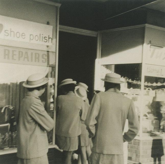 Girls Outside Bootmakers Shop