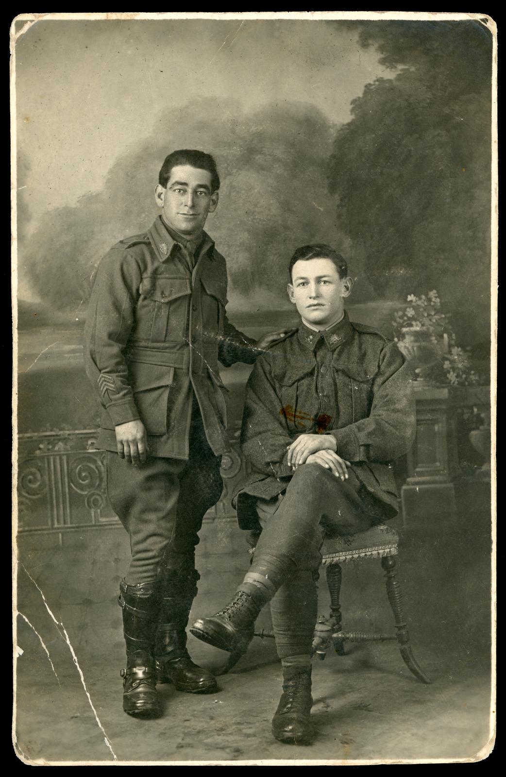First World War black and white photographic postcard of two unidentified soldiers