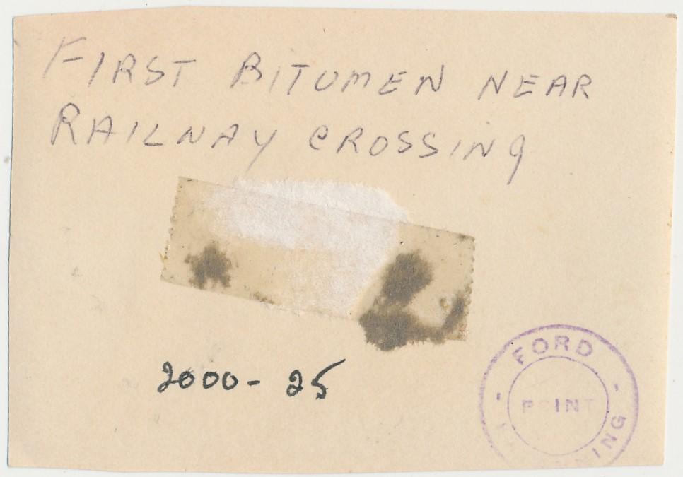 Back of photograph of Railway Crossing at Clive Street