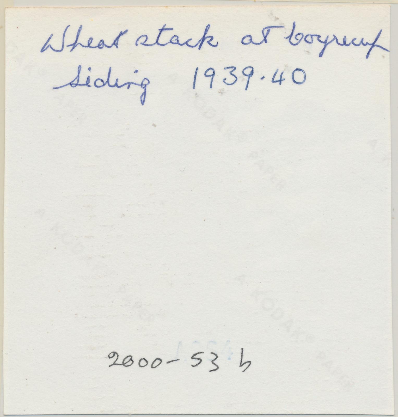 Back of photograph of Coyrecup Siding - Stacking Wheat