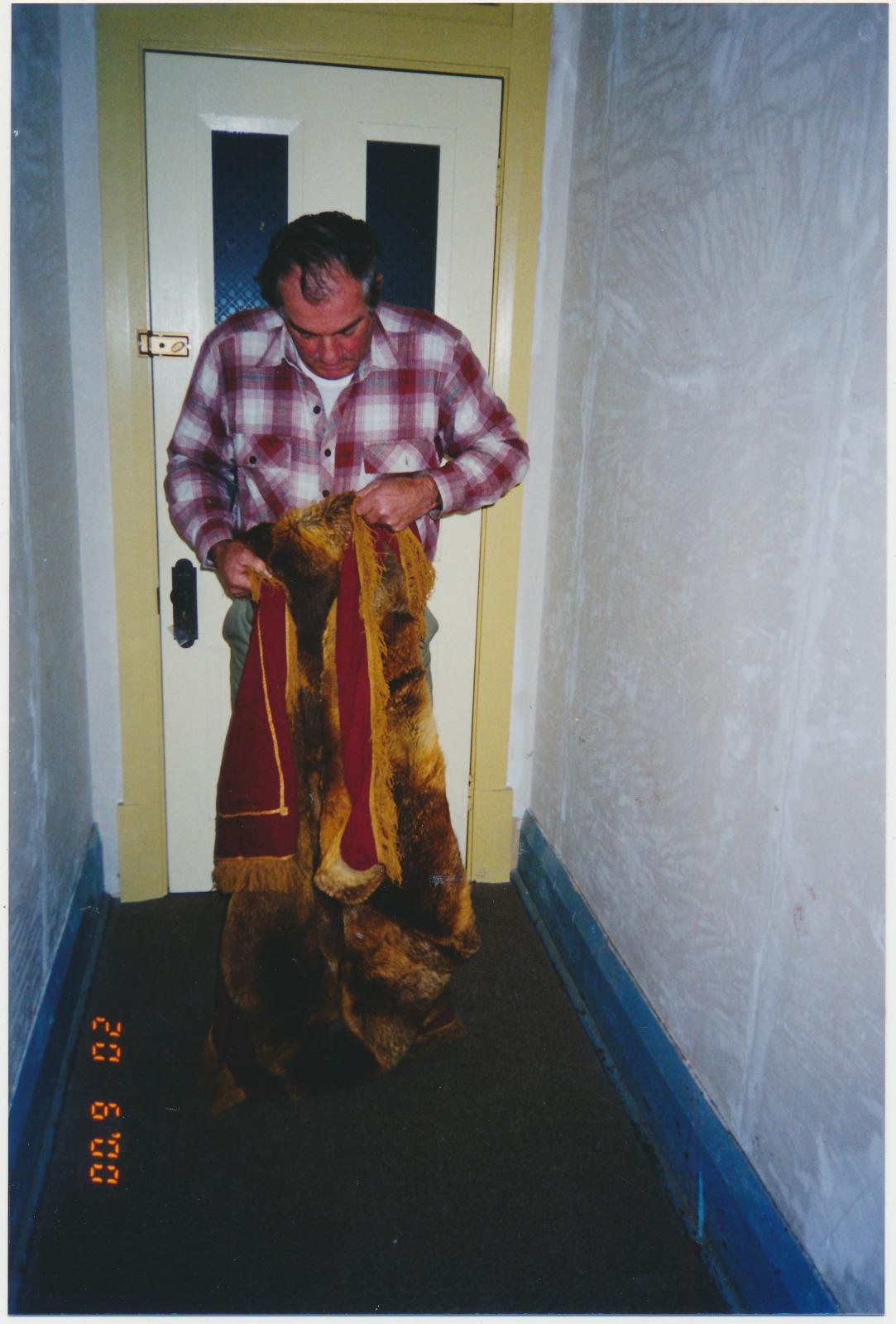 Man holding Fox Skin Rug