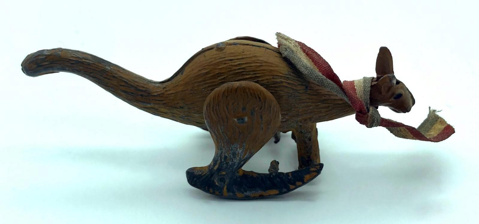 Side view of hopping metal kangaroo