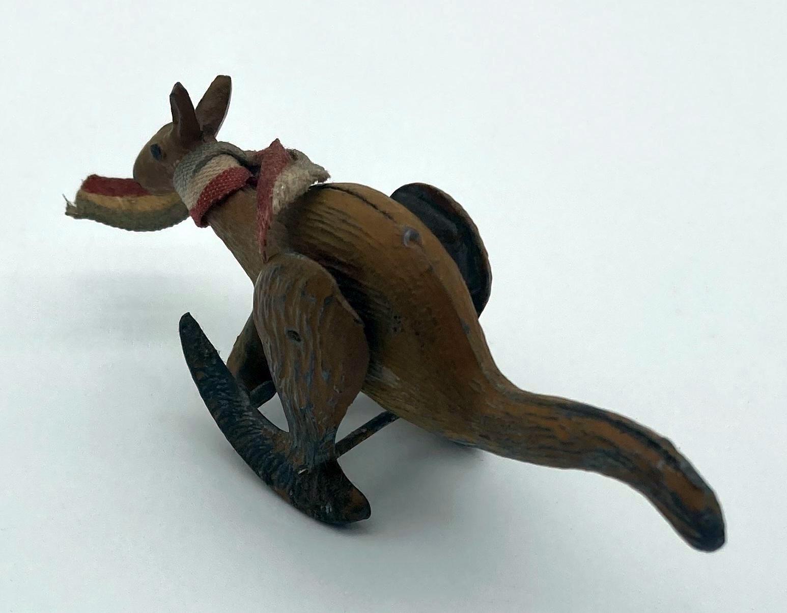 Back view of hopping metal kangaroo