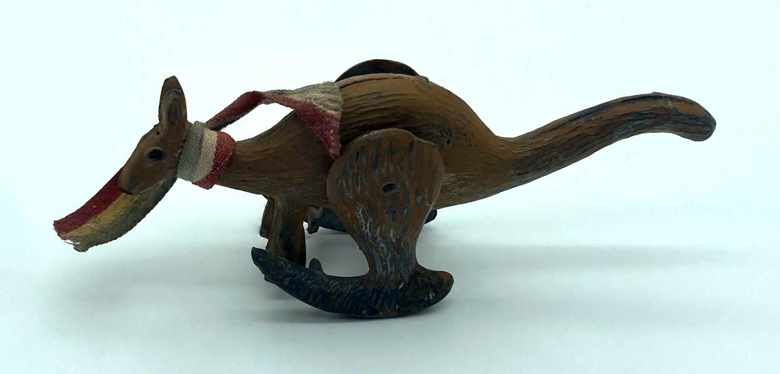 Other side view of hopping metal kangaroo