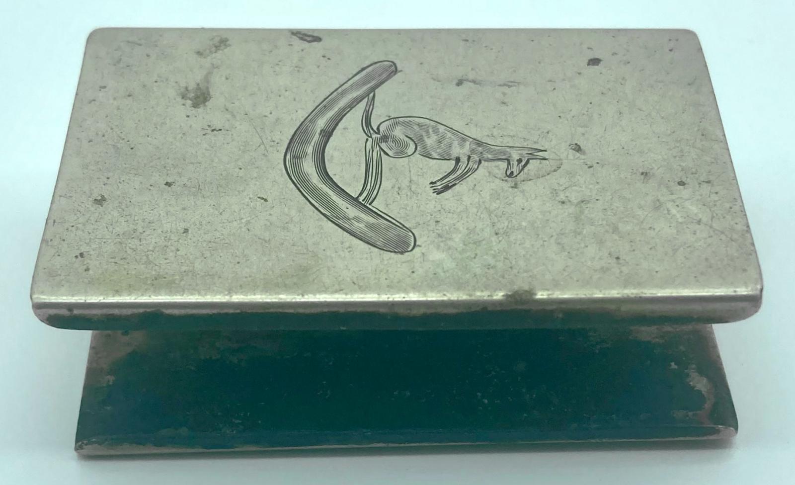 Metal matchbox cover featuring engraving of a kangaroo on a boomerang - other oblique view