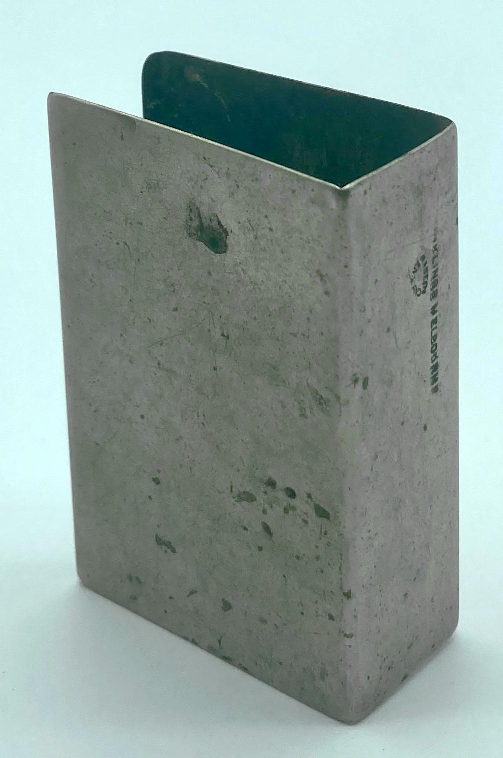 Metal matchbox cover featuring engraving of a kangaroo on a boomerang - other  oblique view