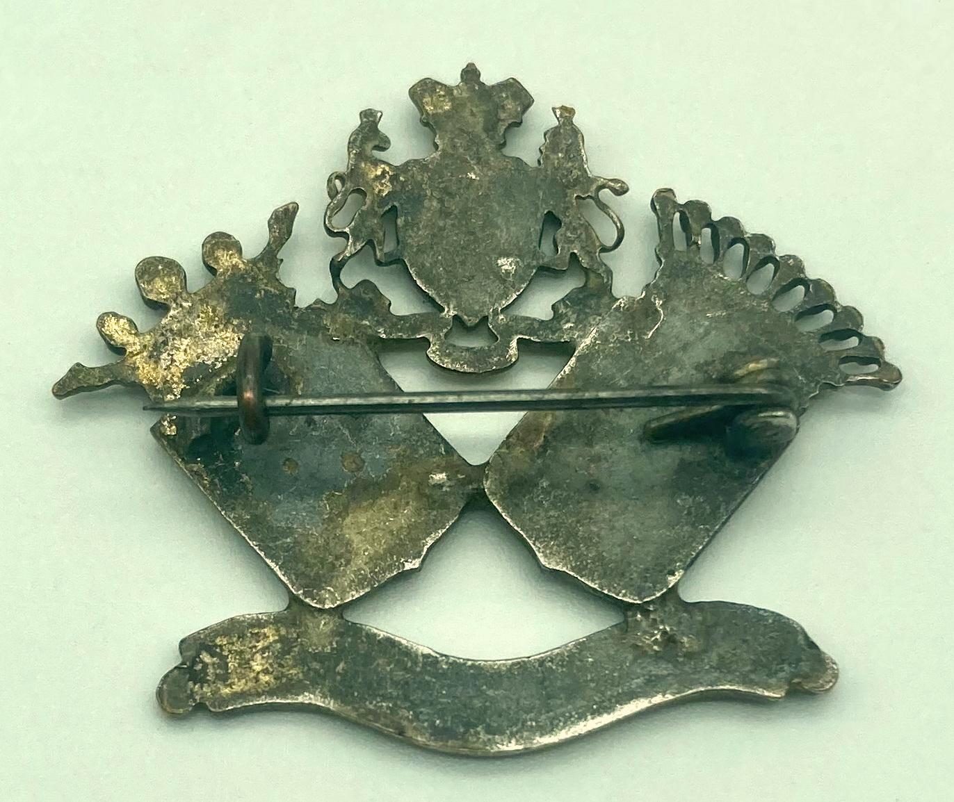 Reverse of WWI souvenir brooch - Ypres