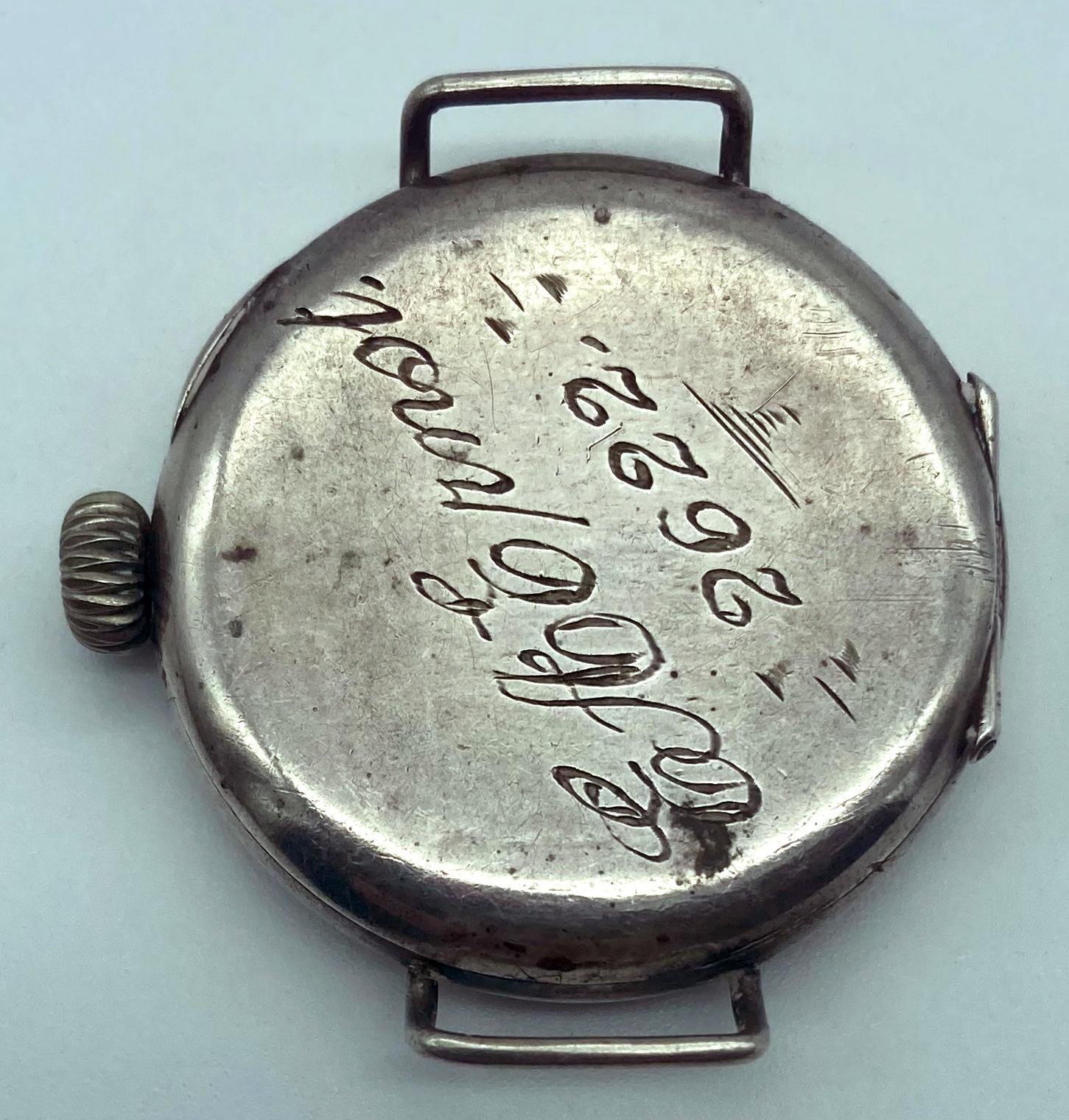 Reverse of WWI trench watch presented to Ernest Allen Ernst - vertical