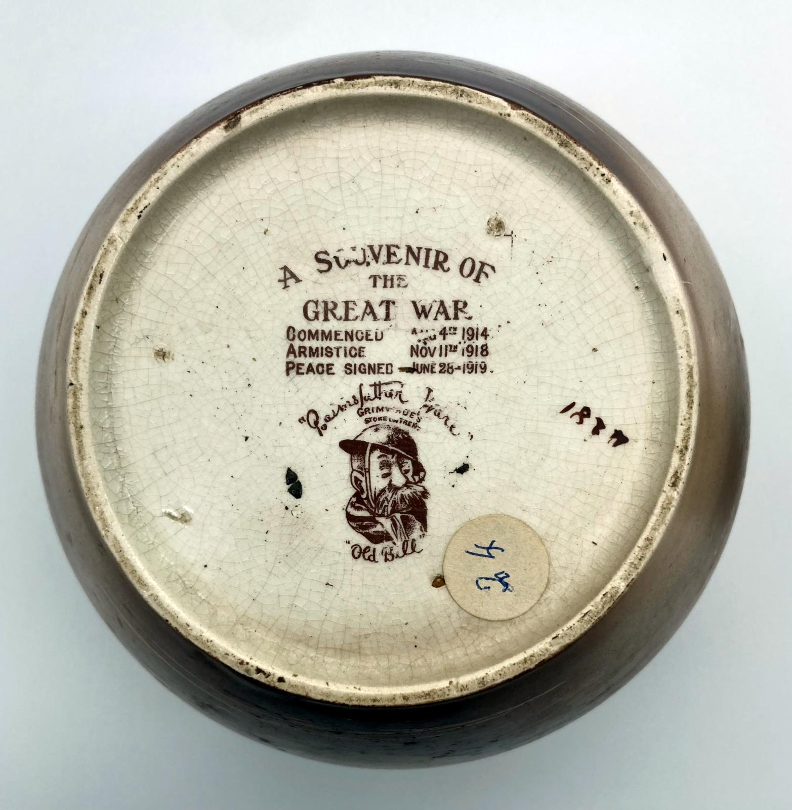 WWI era tobacco jar featuring Bruce Bairnsfather cartoon - base view