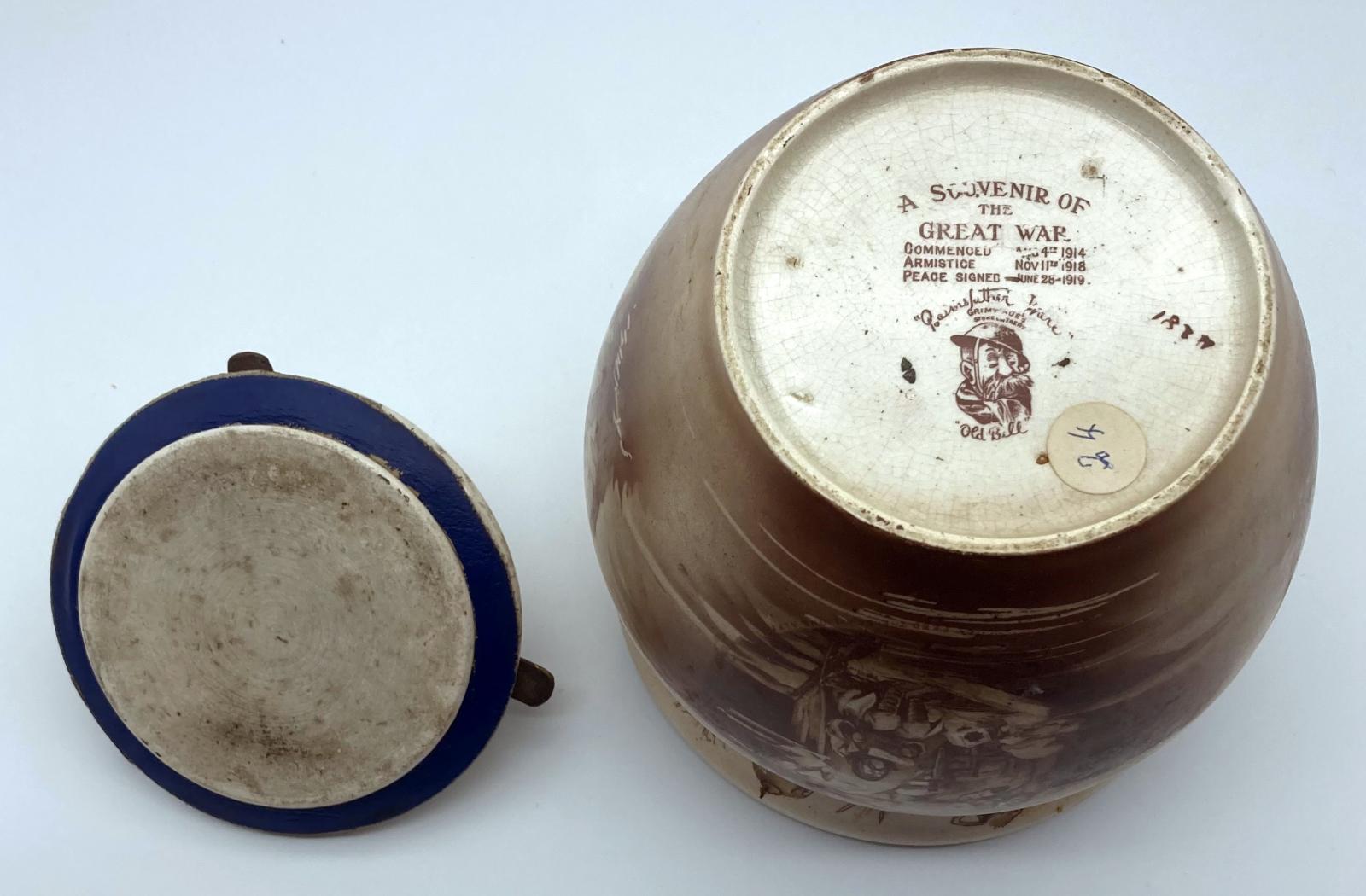WWI era tobacco jar featuring Bruce Bairnsfather cartoon - base view of jar and lid