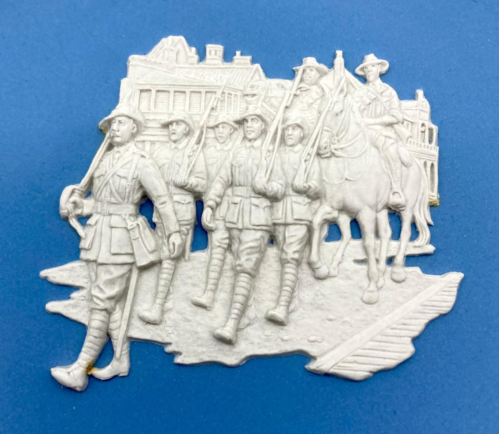 Close up of centre of Wedgwood blue jasperware plate 'Australians at War'