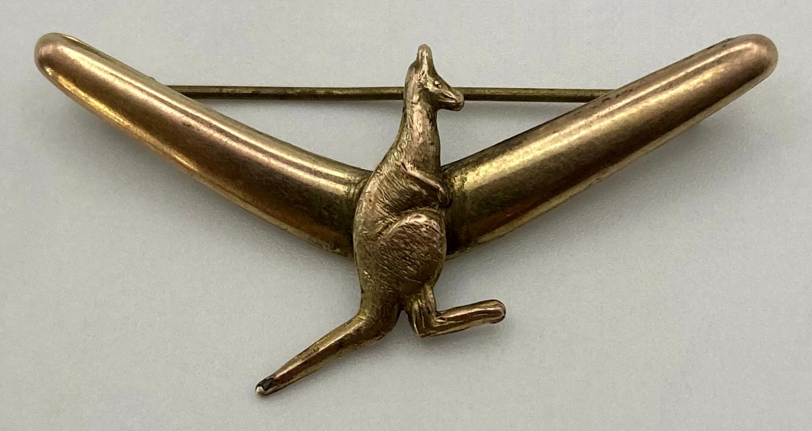 9ct gold, silver lined brooch featuring a kangaroo on a boomerang