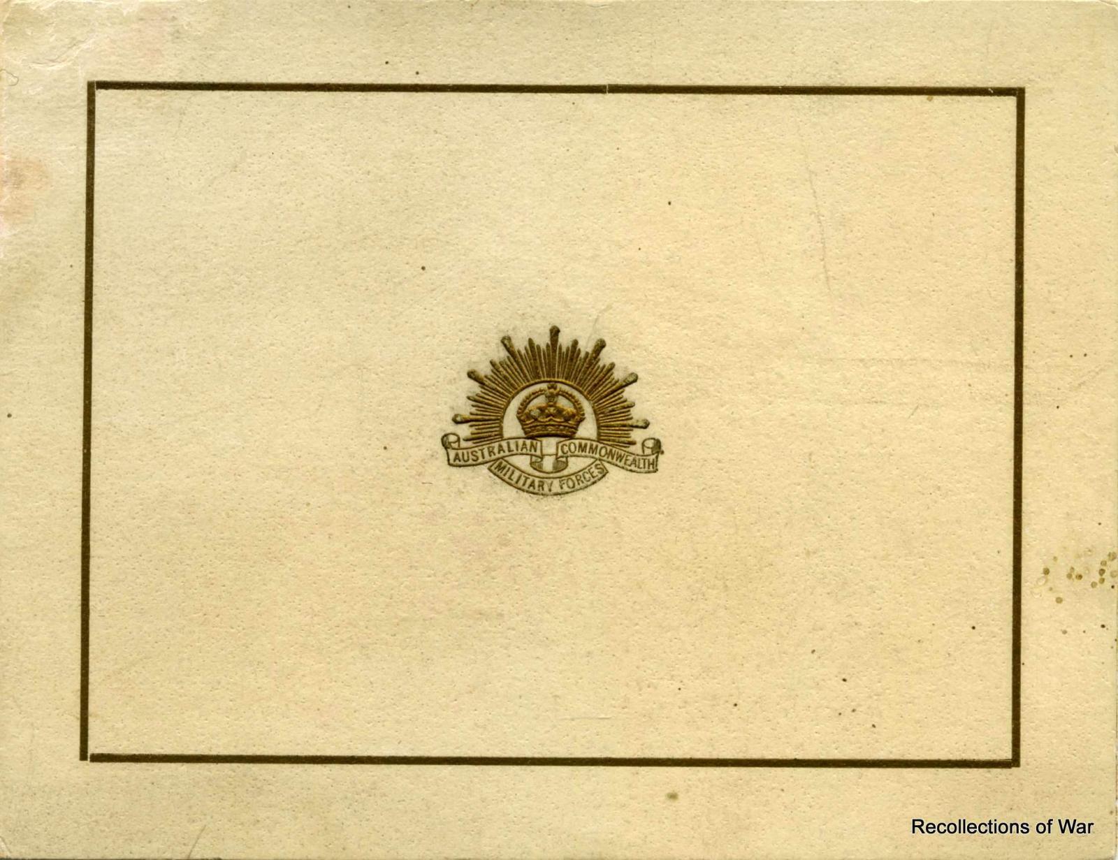 Cover of card showing Rising Sun badge
