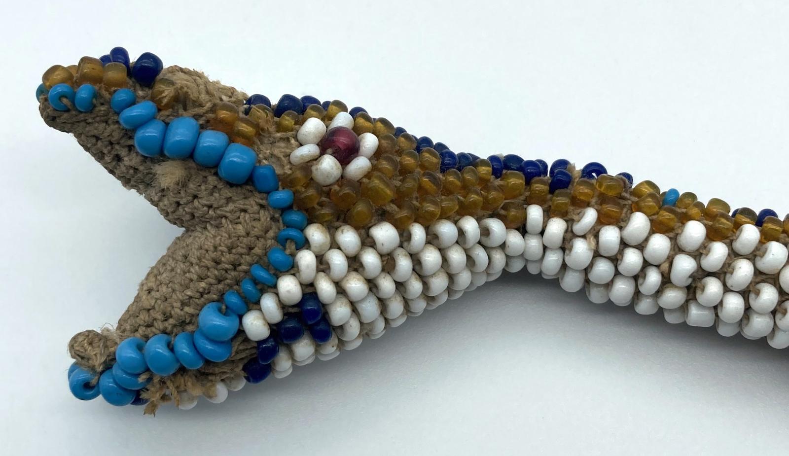 Close up of the head of the Ottoman prisoner of war beadwork snake
