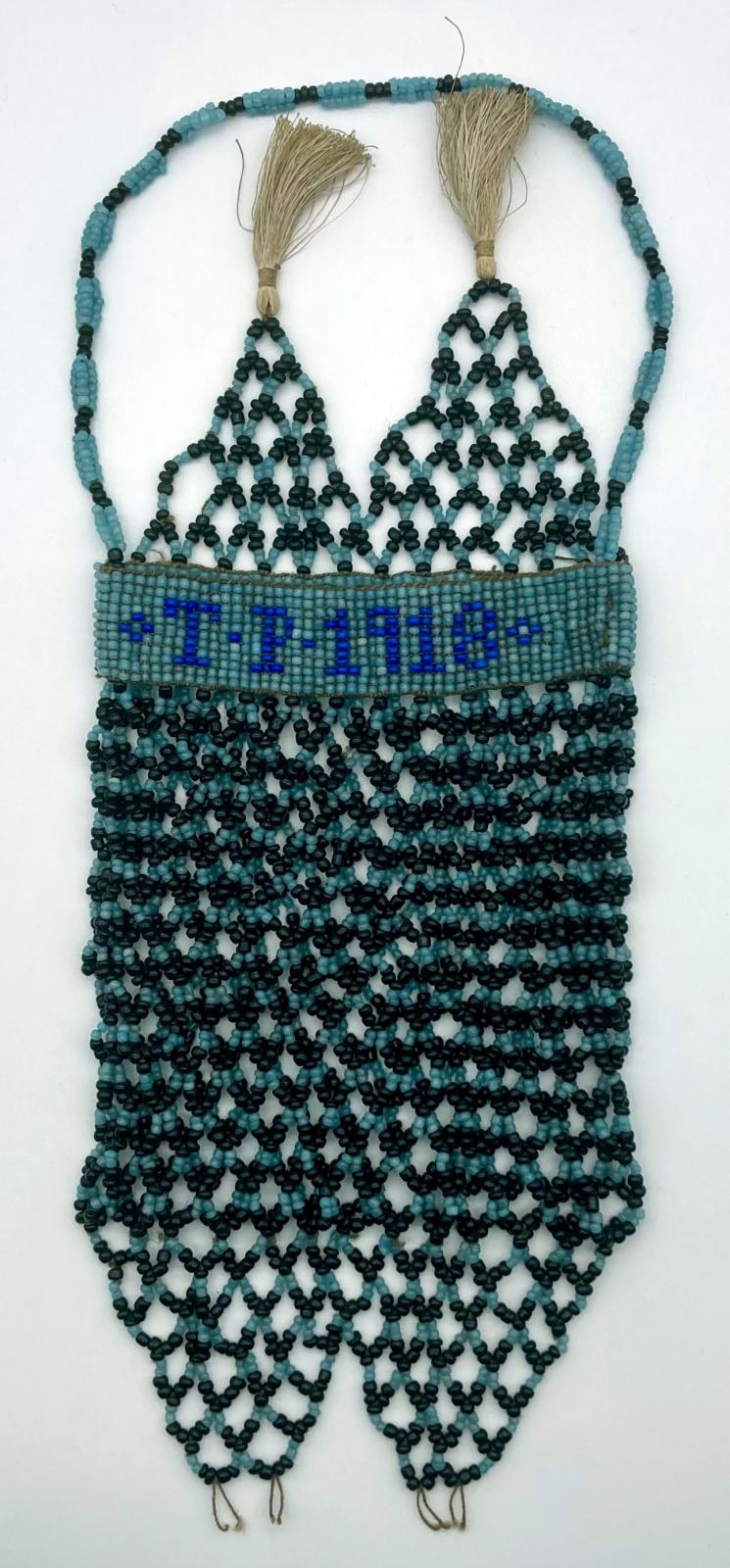 Front of Ottoman prisoner of war beadwork bag with tassels