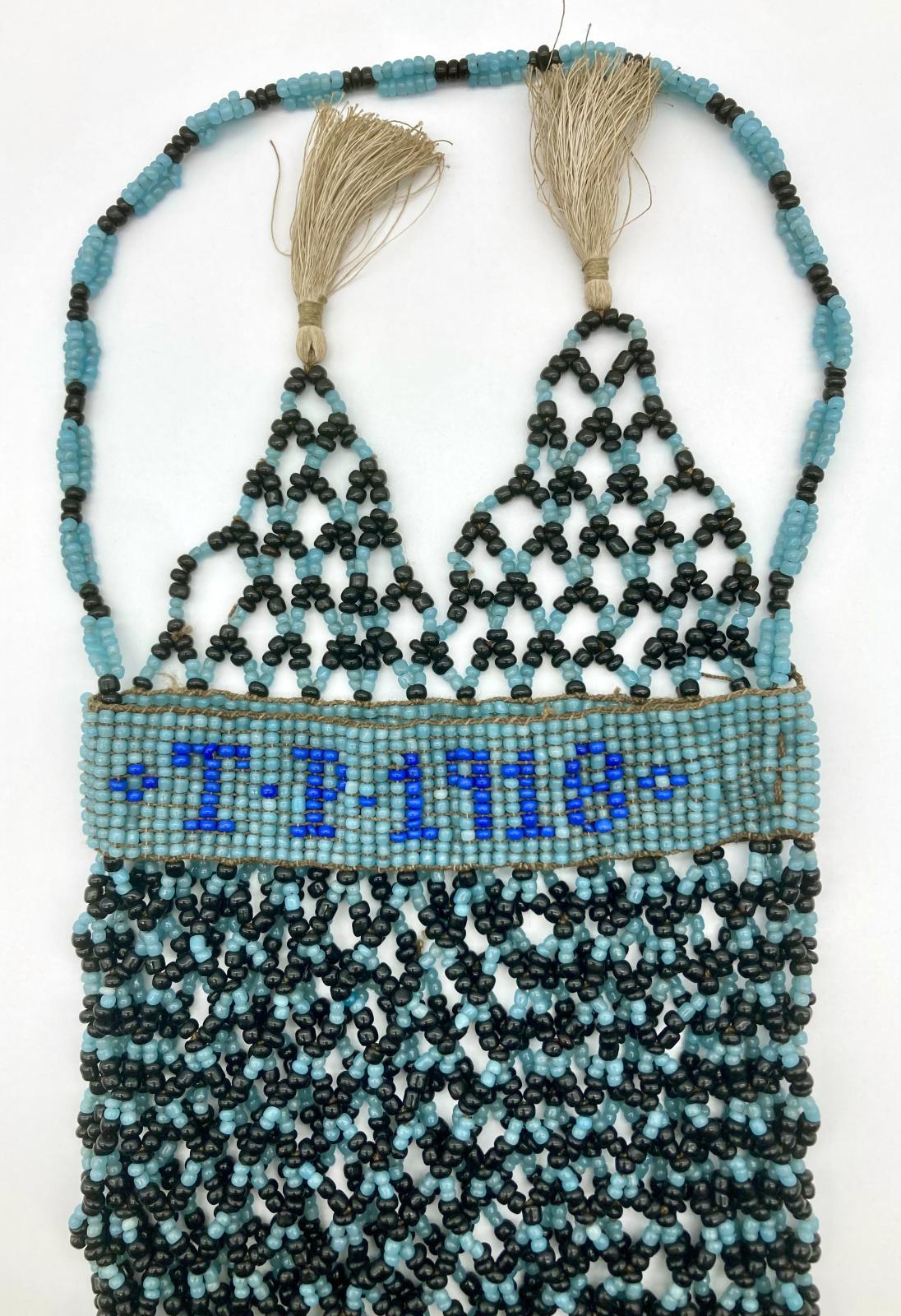 Upper section of front of Ottoman prisoner of war beadwork bag with tassels