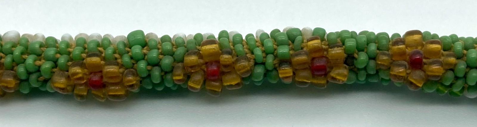 Close up of the top view of a section of the small Ottoman prisoner of war beadwork snake