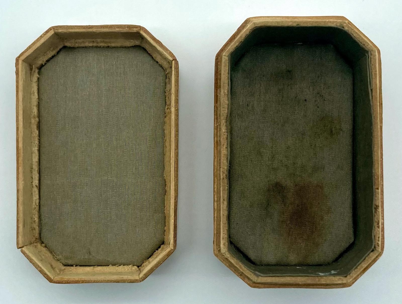 Lacquered timber box with bird motif - view of inside of both sections from above
