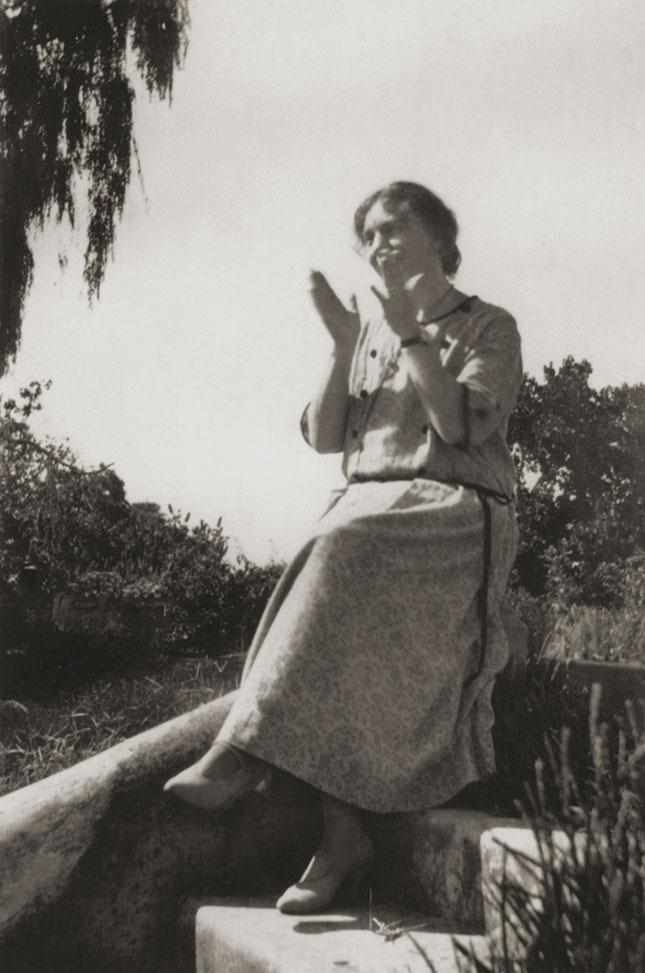 Woman On Concrete Steps