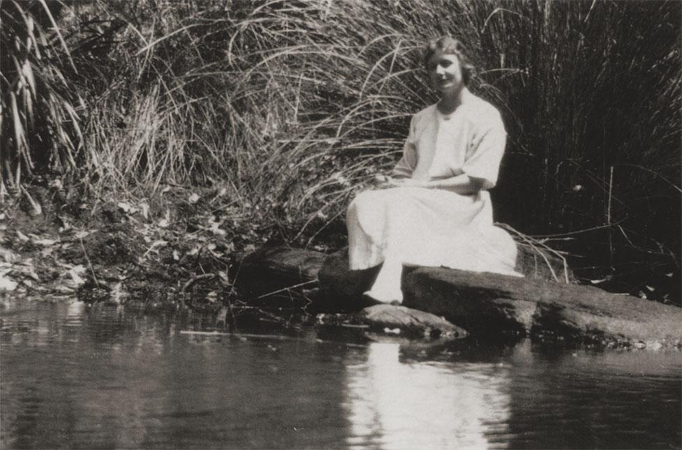 Woman At River’s Edge