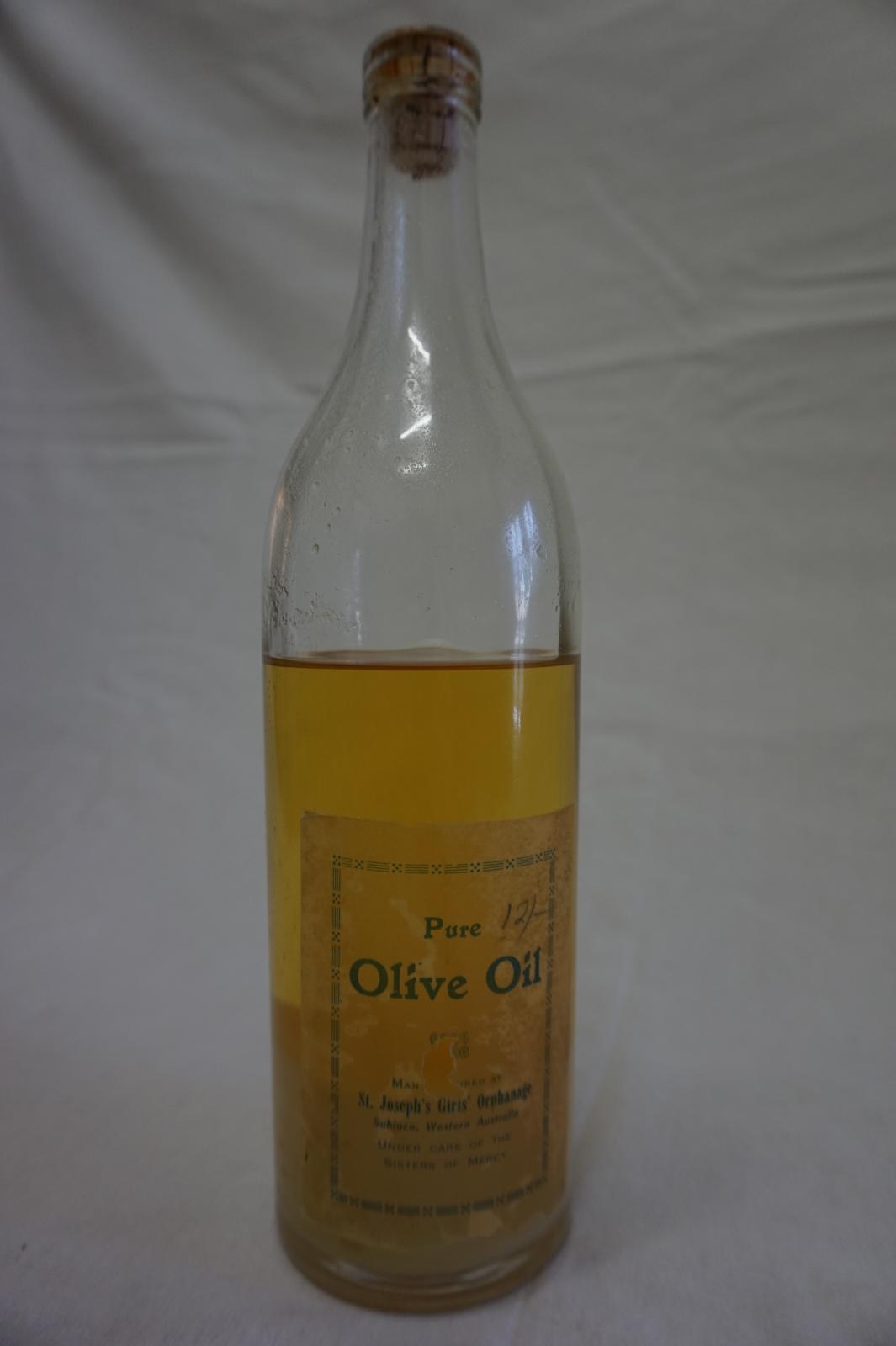 Clear Glass Bottle with Cork - St Joseph's Orphange Label - Contains Oil
