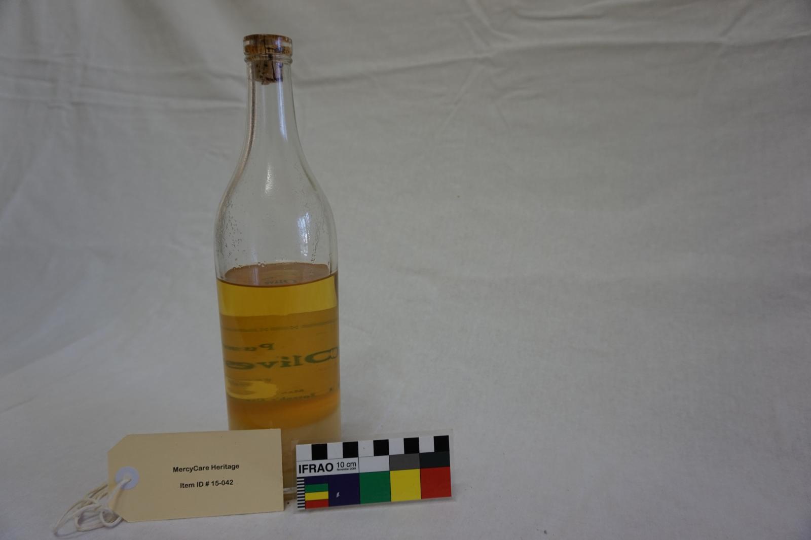 Clear Glass Bottle with Cork - St Joseph's Orphange Label - Contains Oil