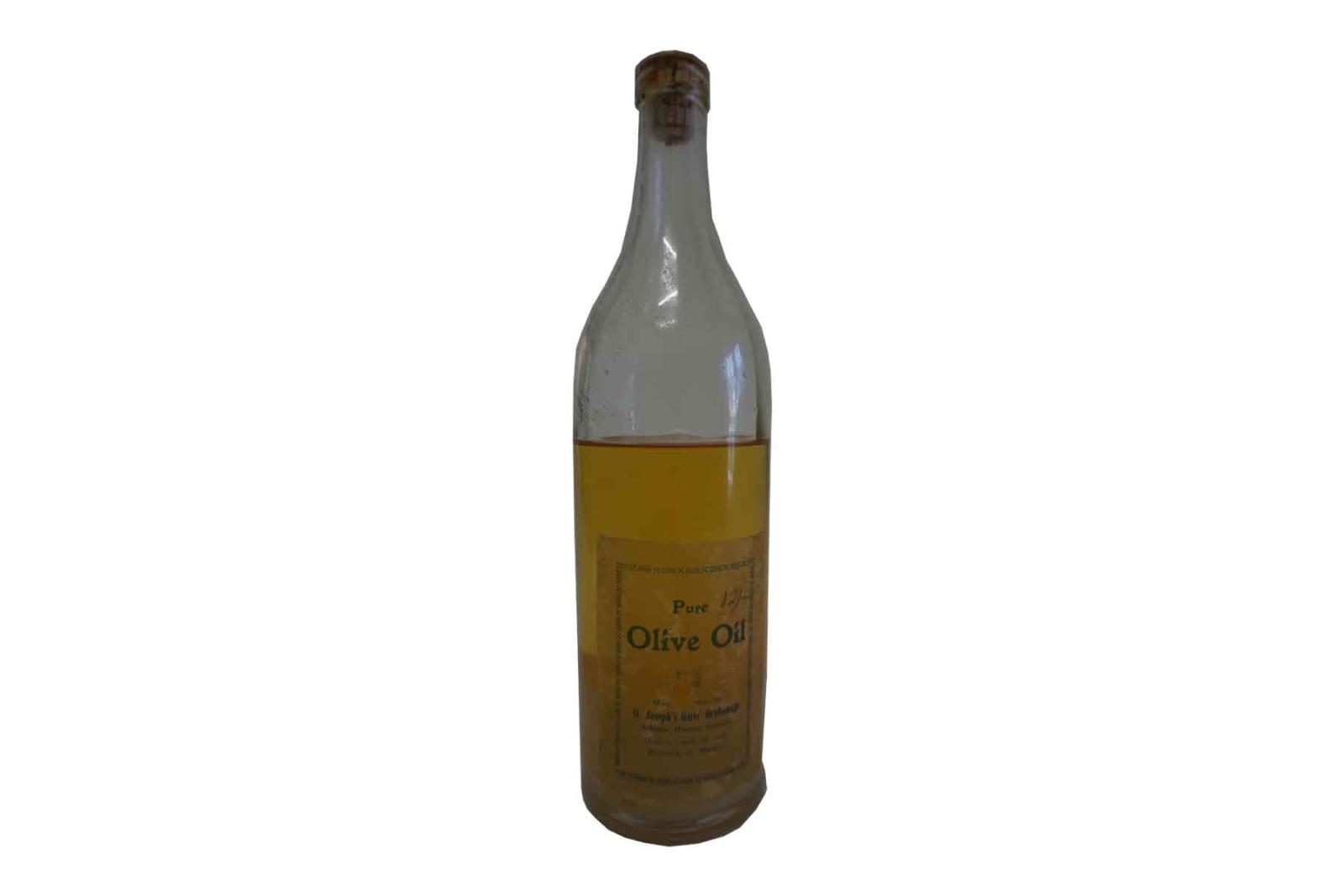 Clear Glass Bottle with Cork - St Joseph's Orphange Label - Contains Oil