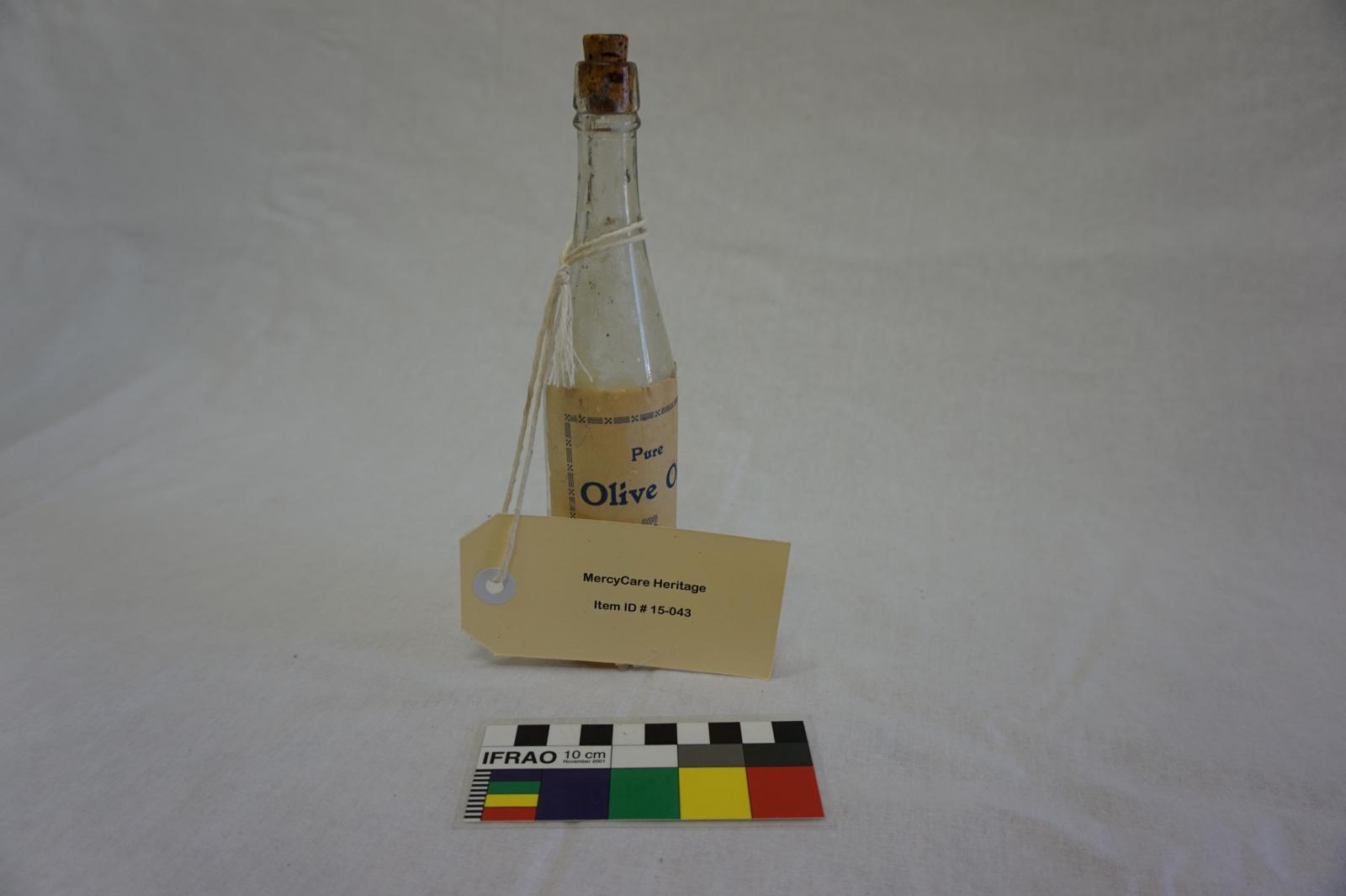 Clear Glass Bottle with Cork - St Joseph's Orphange Label - Contains Oil
