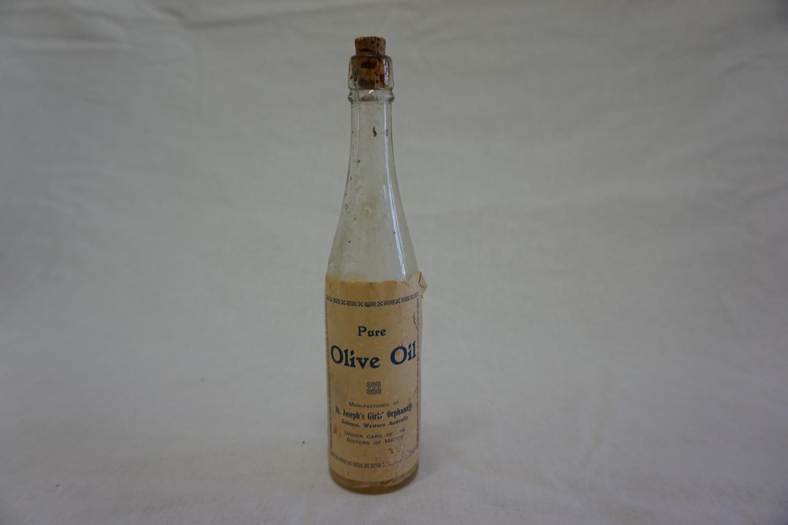 Clear Glass Bottle with Cork - St Joseph's Orphange Label - Contains Oil
