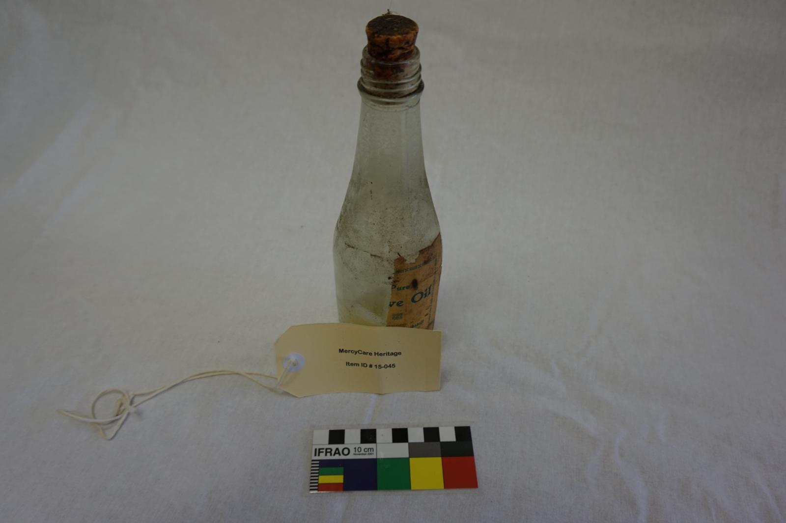 Clear Glass Bottle with Cork - St Joseph's Orphange Label - Contains Oil